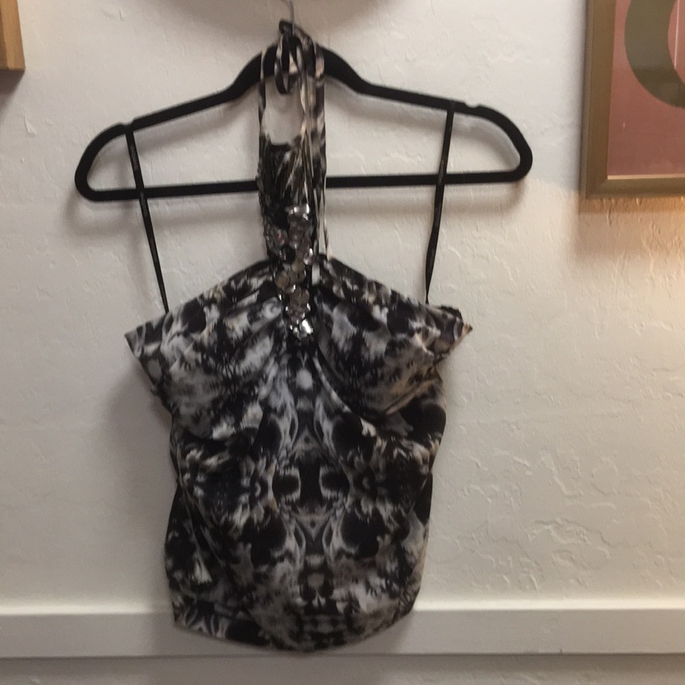 Brand is bebe. Color is white, gray, black, gold.